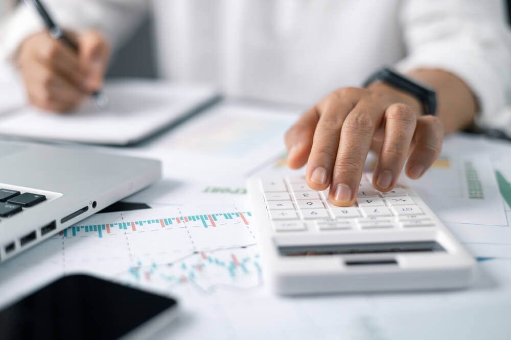 Business man using a calculator